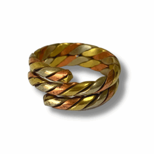 Close-up of a three-line braided metal ring in warm gold-toned metal, showing a textured, twisted band with a slightly irregular handmade finish.