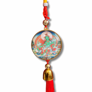 Red tassel hanging ornament with a round medallion depicting Green Tara, braided cord top and gold bell accen