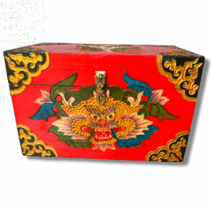 Red hand-painted Tibetan treasure box with a raised golden dragon face motif, ornate floral patterns, and decorative metal clasp on the lid.