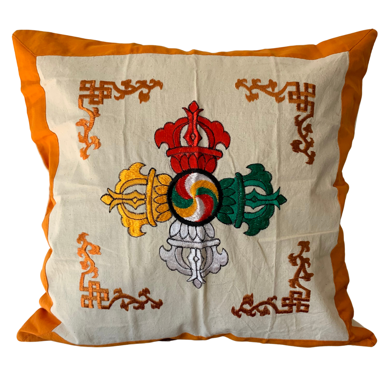 A cushion cover featuring a multicolored geometric pattern with a central Vajra design, bordered with a orange trim on a white background.