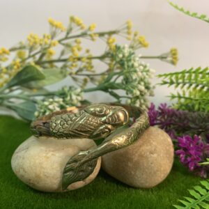 brass, white metal and copper cuff bracelet with snake head and tail detail