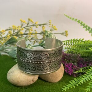 white metal cuff with filigree design