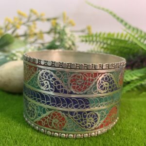 filigere cuff with red, turquoise, blue colours