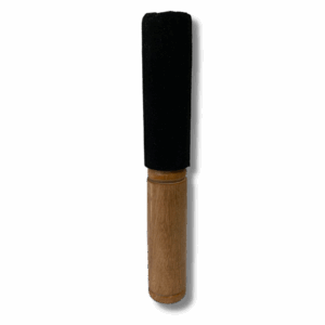 Wooden and suede singing bowl mallet with natural timber handle and black padded striking end.