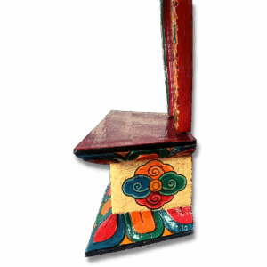 Hand-painted Tibetan wooden altar throne with a red arched backrest, carved gold and green detailing, and a small platform decorated with two snow lions and a flaming jewel motif.