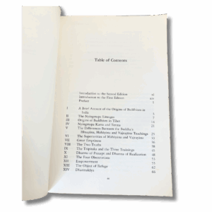 Open book showing the Table of Contents page of The Small Golden Key by Thinley Norbu, listing chapter titles on topics such as the origins of Buddhism, the Nyingmapa lineage, Mahāyāna and Vajrayāna teachings, emptiness, the two truths, refuge, and Dharmakāya.