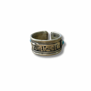 Silver Tibetan mantra ring with engraved script and turquoise side stones, adjustable open band design.
